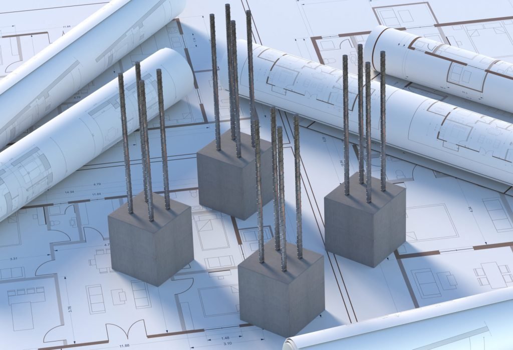 Reinforced concrete columns, steel bars reinforcement, Foundation slab and footings on blueprint plans, under construction, unfinished building project, and structural design concept. 3d illustration